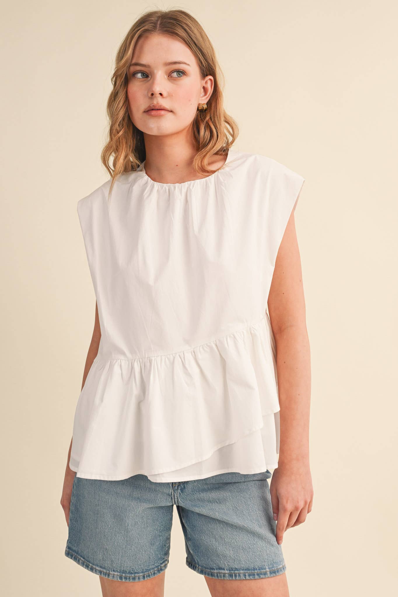 RUFFLED PEPLUM HEM TOP