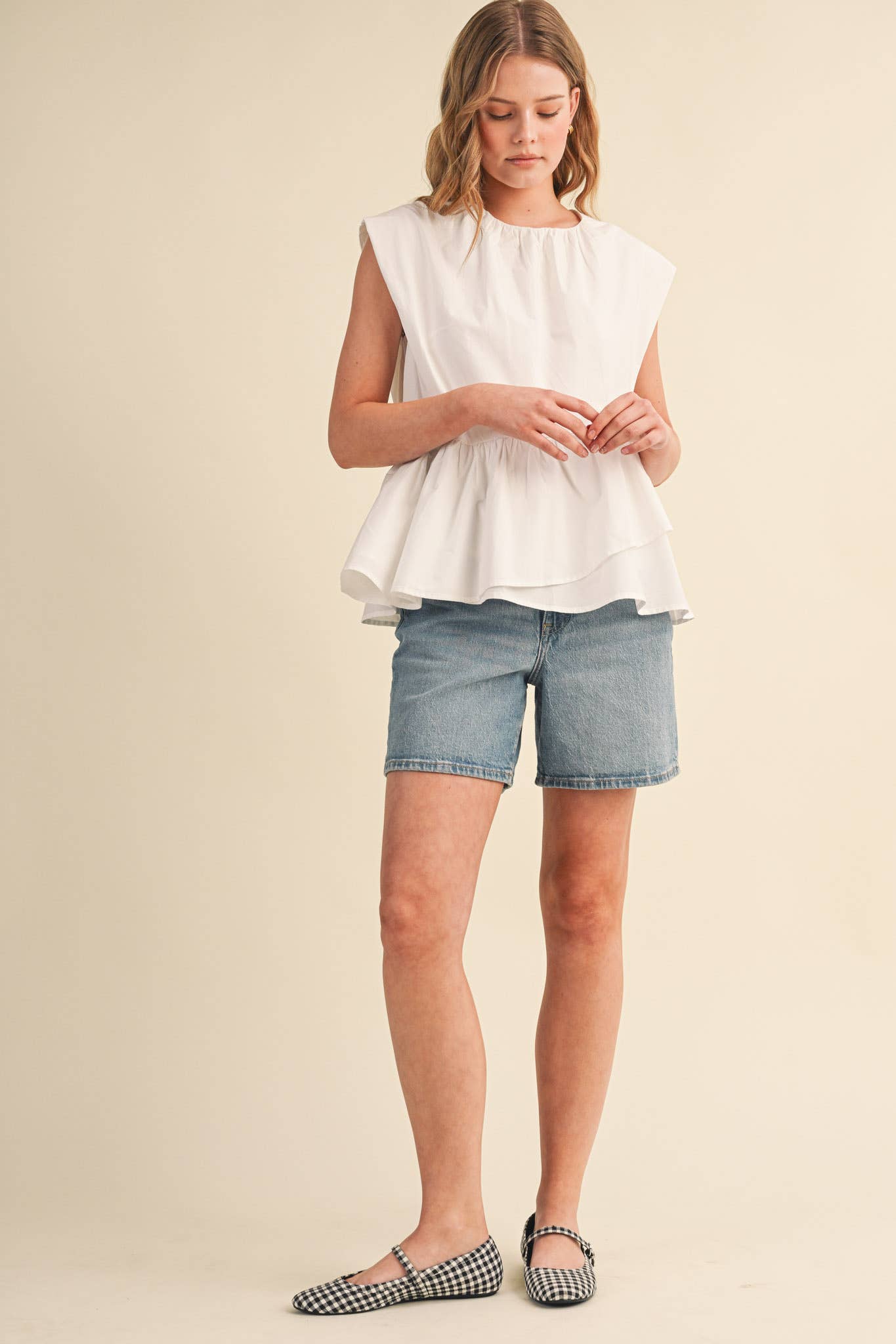 RUFFLED PEPLUM HEM TOP