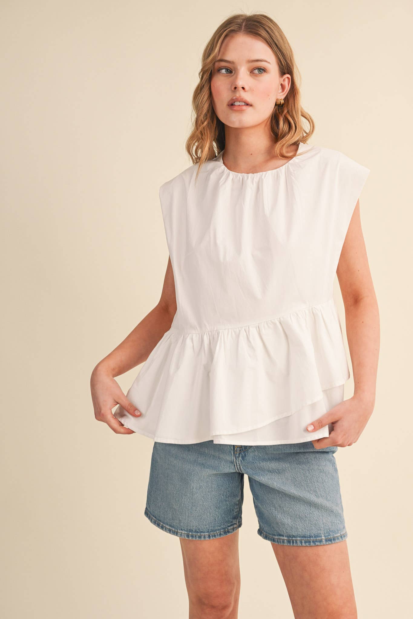 RUFFLED PEPLUM HEM TOP