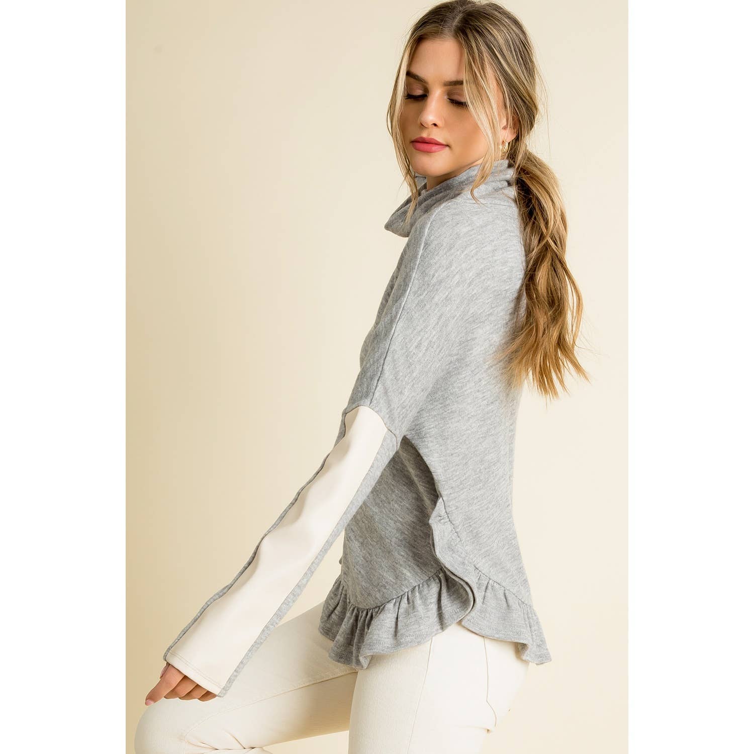 Ruffle Hem Knit Turtleneck