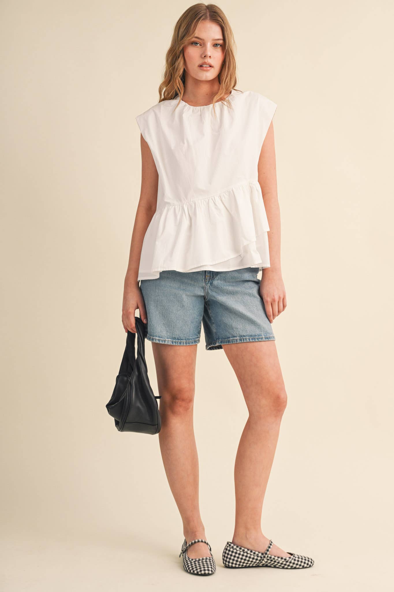 RUFFLED PEPLUM HEM TOP