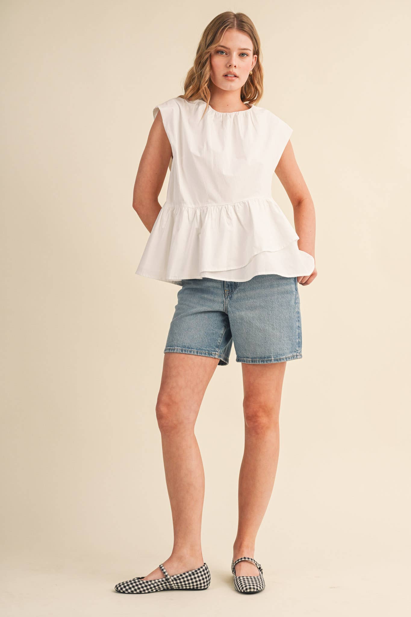 RUFFLED PEPLUM HEM TOP
