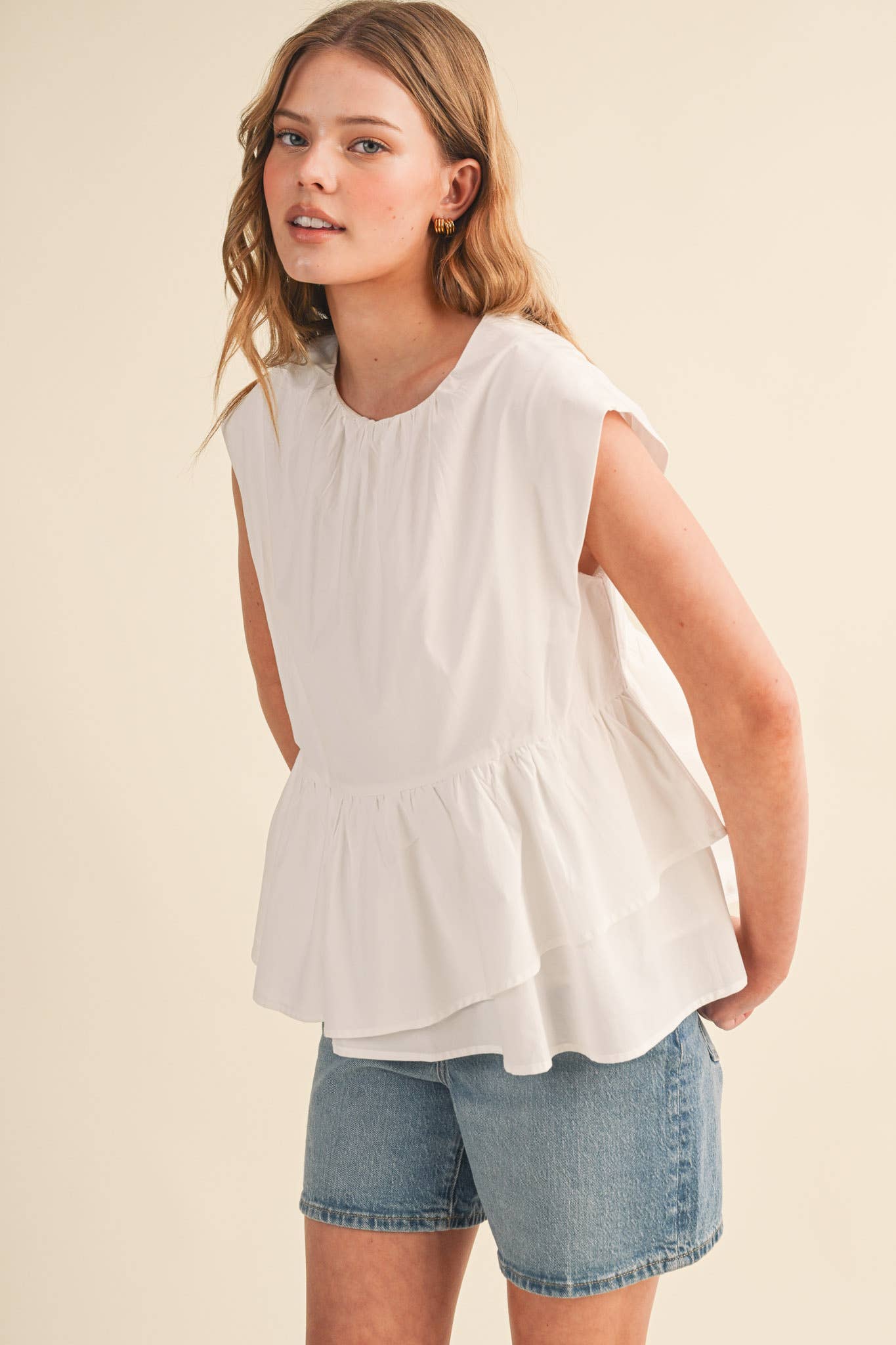 RUFFLED PEPLUM HEM TOP
