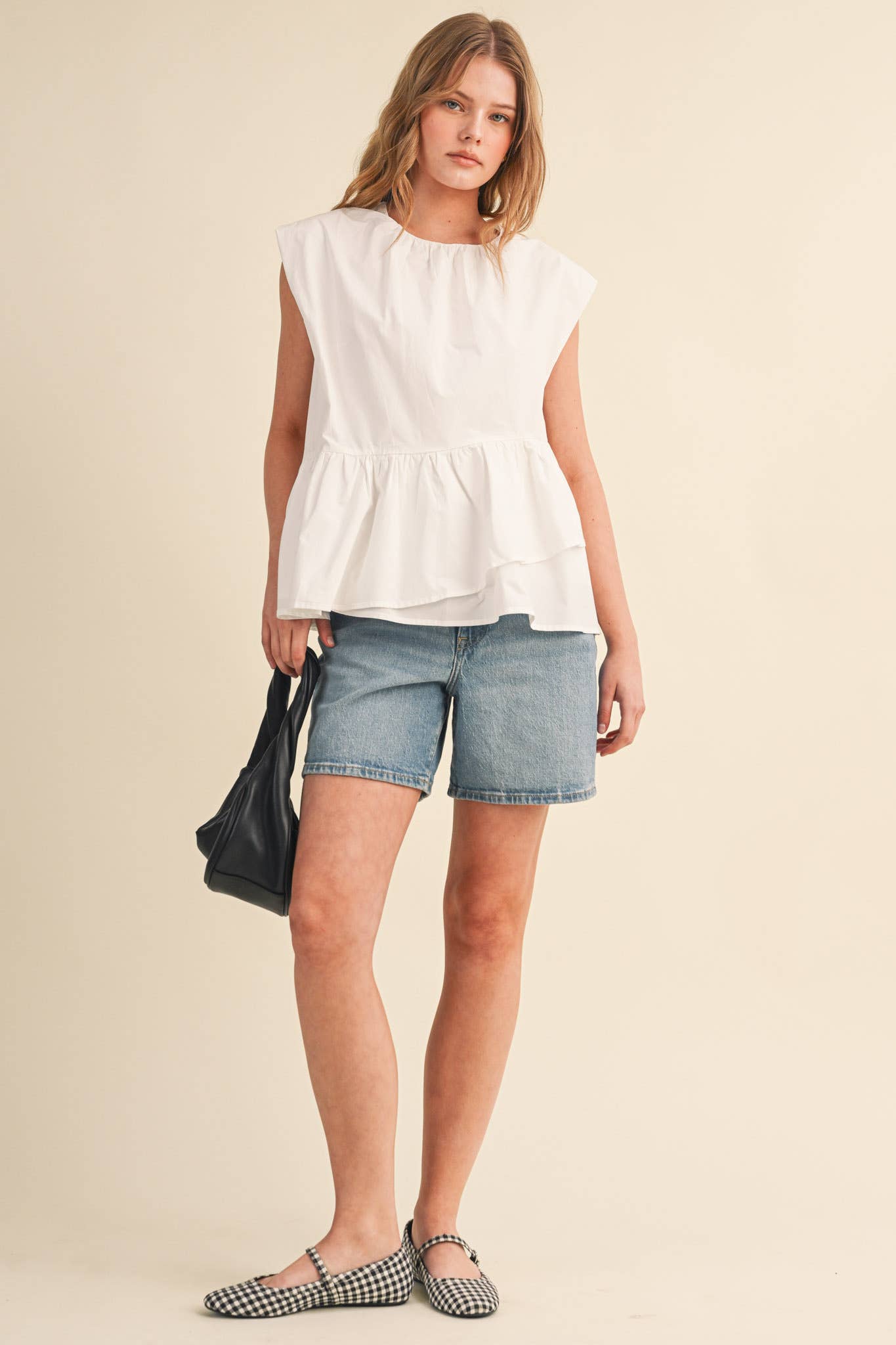 RUFFLED PEPLUM HEM TOP