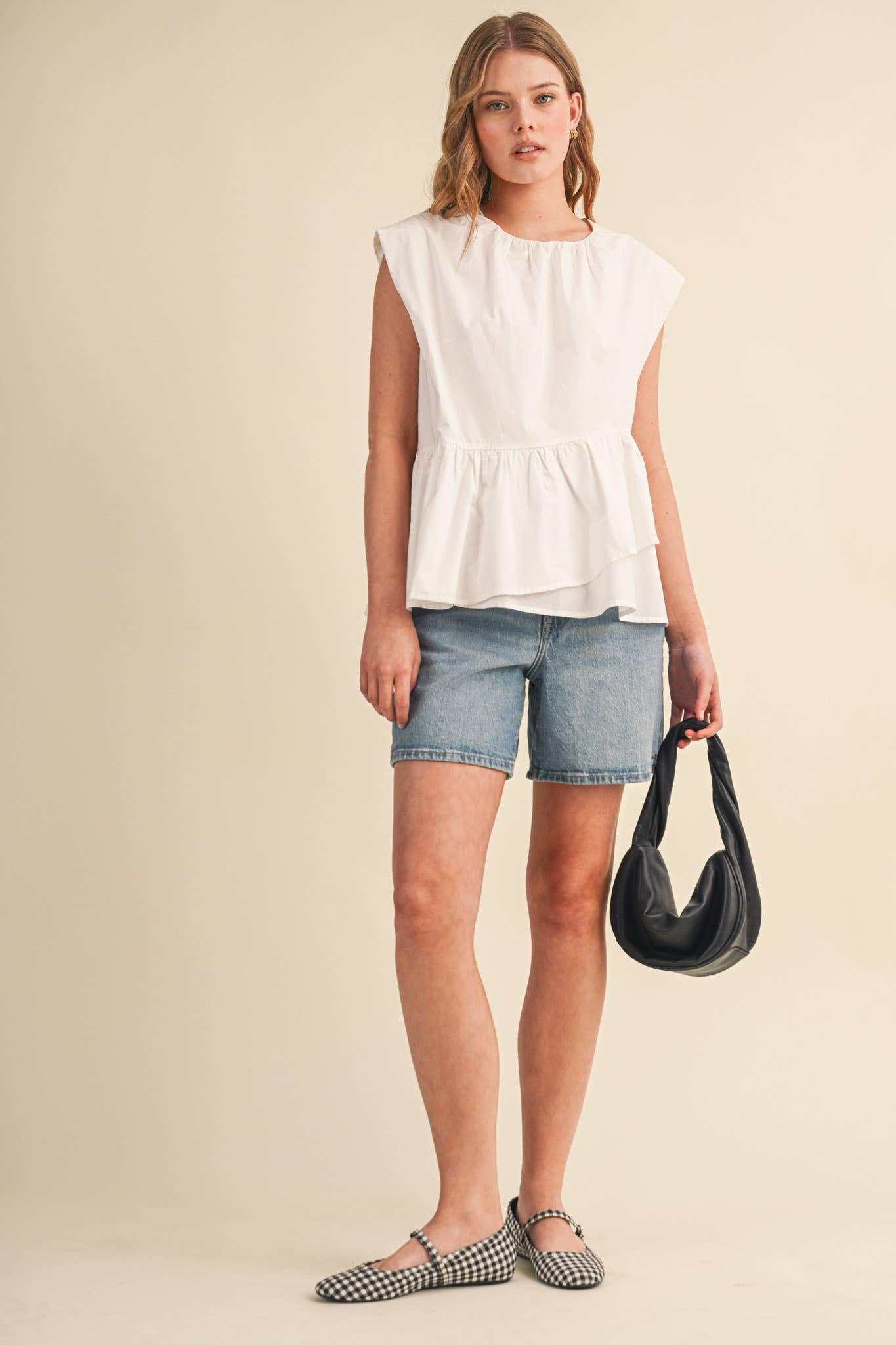 RUFFLED PEPLUM HEM TOP