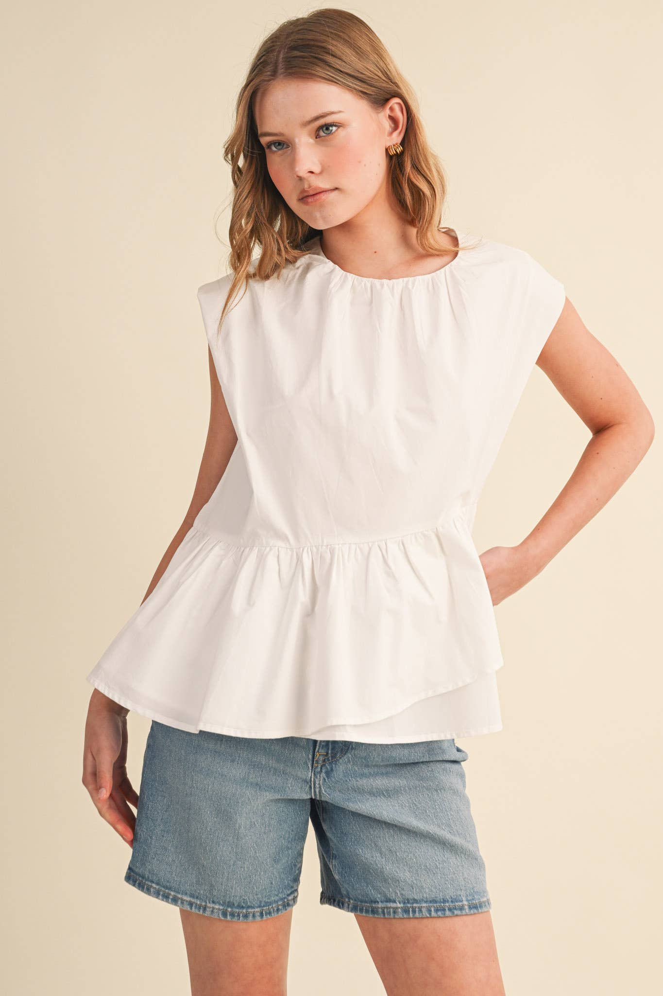 RUFFLED PEPLUM HEM TOP