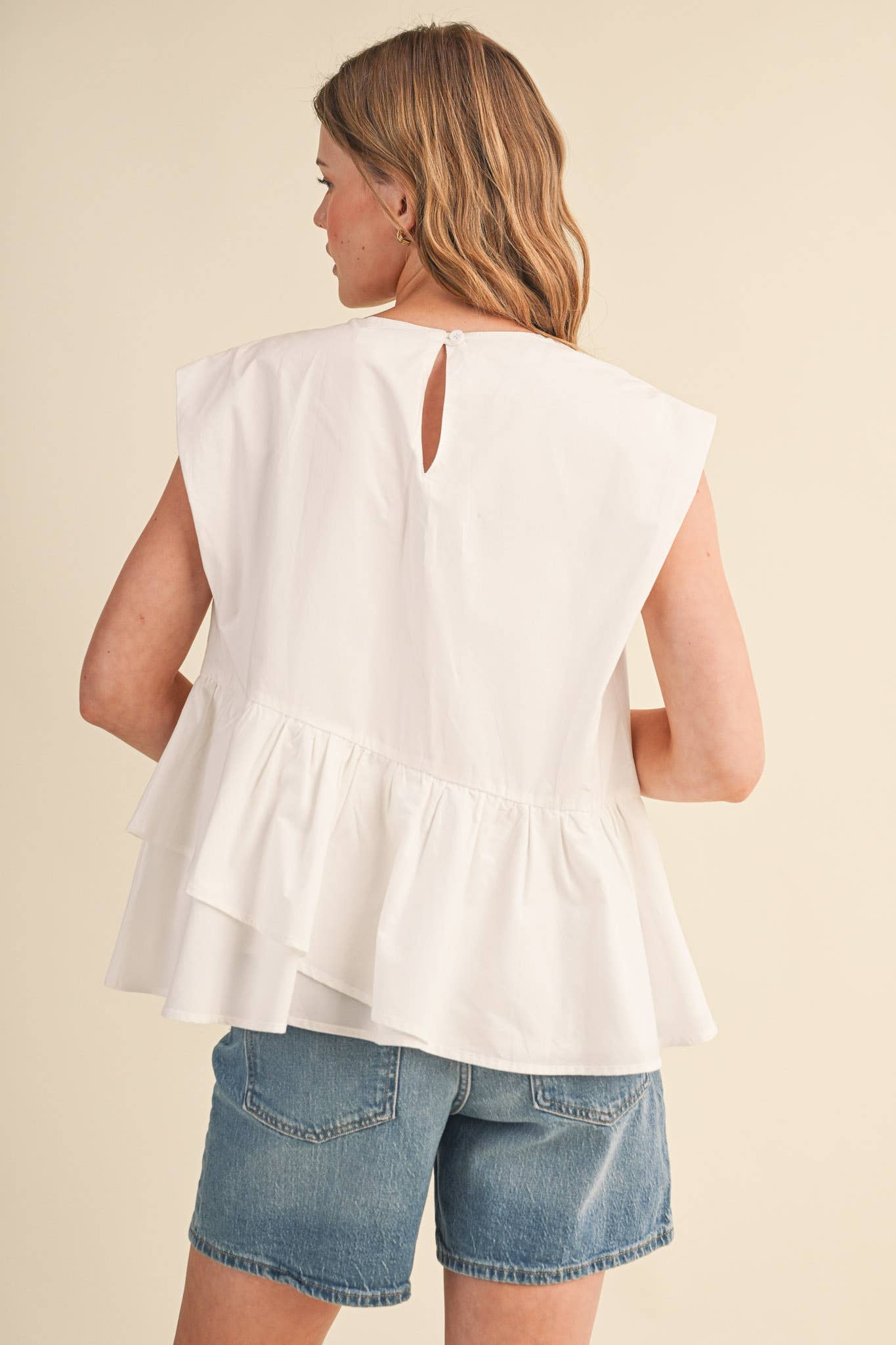 RUFFLED PEPLUM HEM TOP