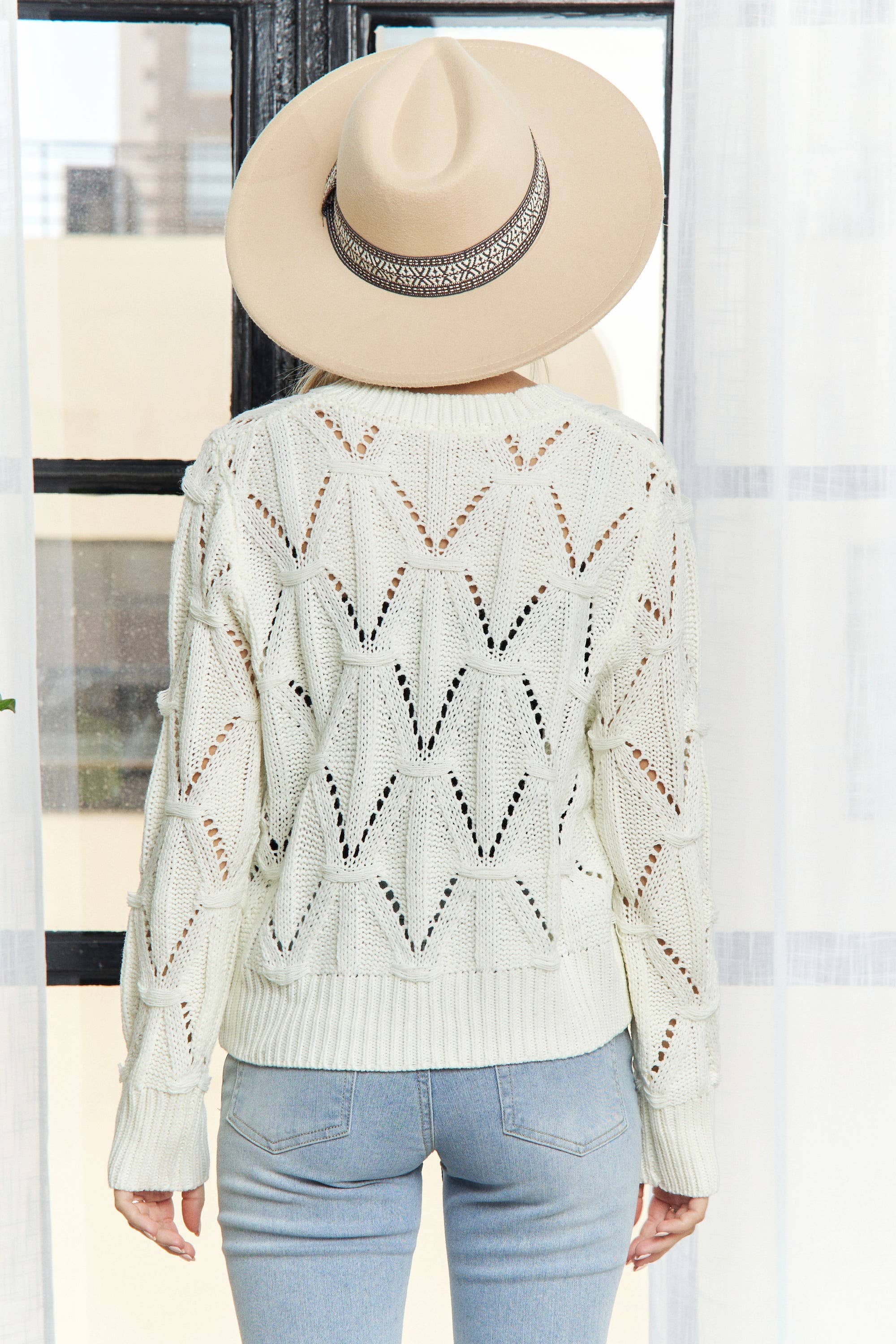 TEXTURED KNIT SWEATER